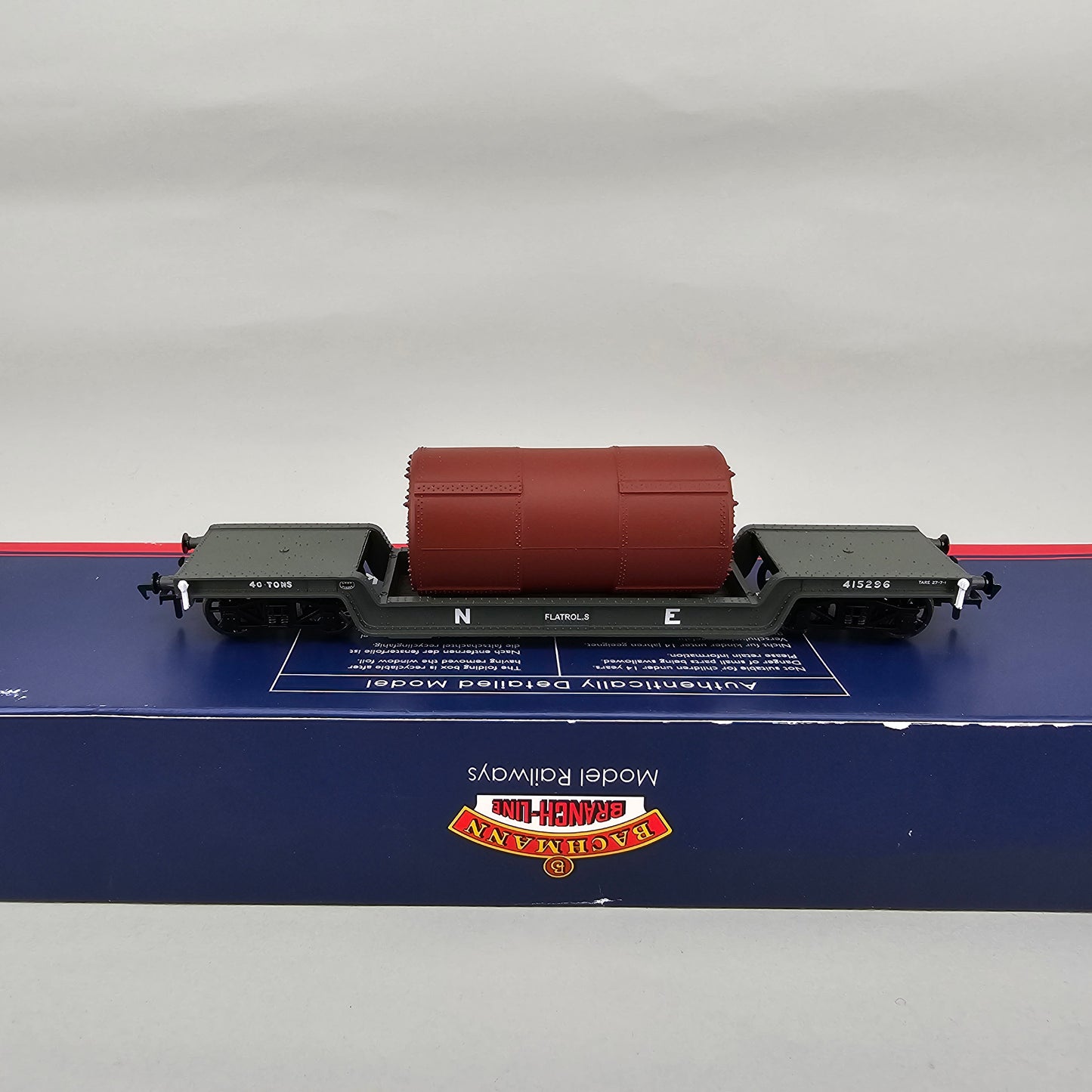 Bachmann 33-879A OO Gauge Bogie Well Wagon LNER Grey with Boiler load - Chester Model Centre