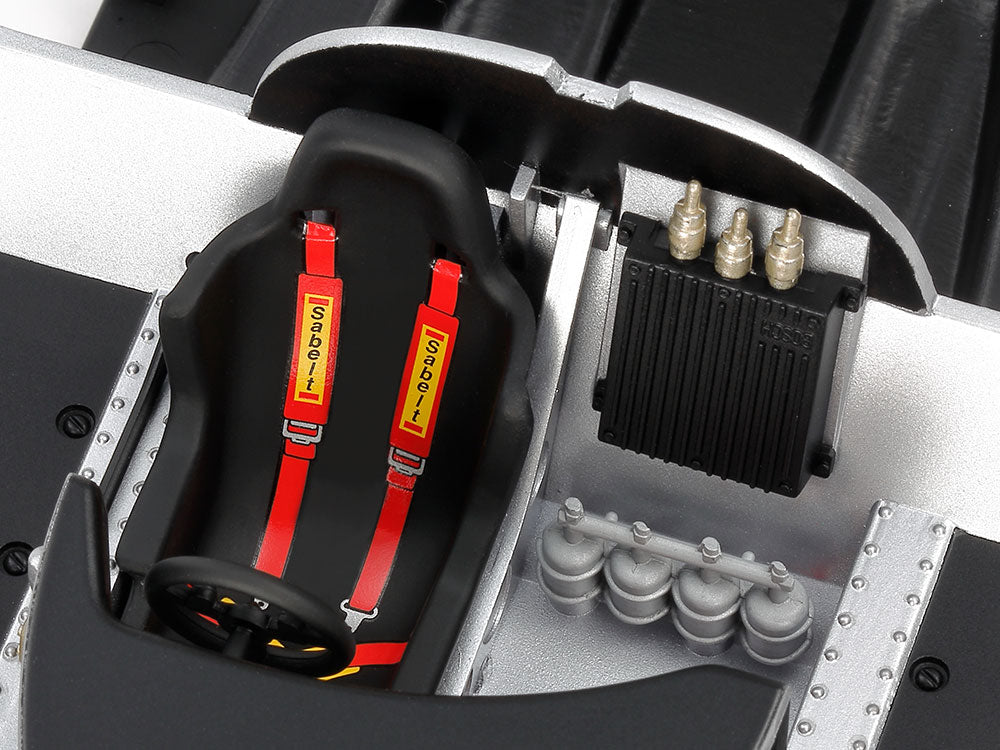 The interior has renderings of the full bucket seat, fire extinguisher, bulkhead-affixed engine management system and more.