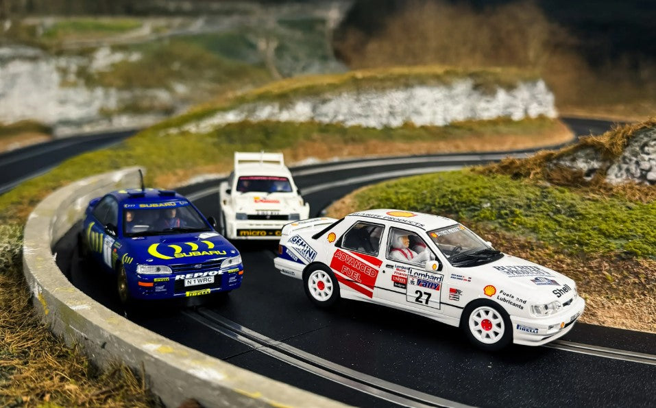 SCALEXTRIC C4612A Colin McRae - Triple Car Pack - Ford Sierra Sapphire RS Cosworth No.27 (1997), MG Metro 6R4 N.3 (2006), Subaru Impreza No.1 (1996)