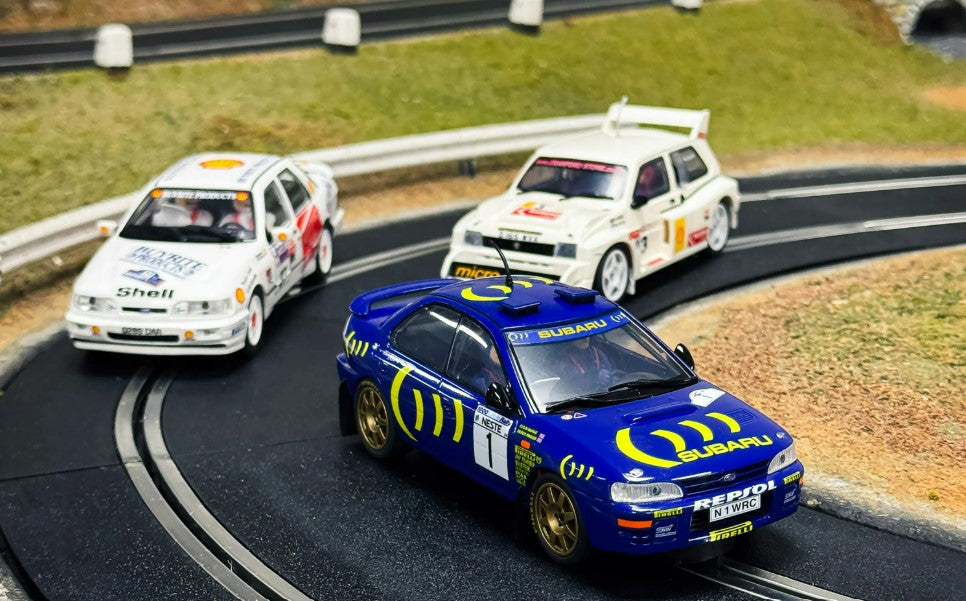 SCALEXTRIC C4612A Colin McRae - Triple Car Pack - Ford Sierra Sapphire RS Cosworth No.27 (1997), MG Metro 6R4 N.3 (2006), Subaru Impreza No.1 (1996)